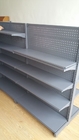 La estantería de la exhibición del supermercado del estante de la góndola con el tablero de perforación doble/escoge echado a un lado