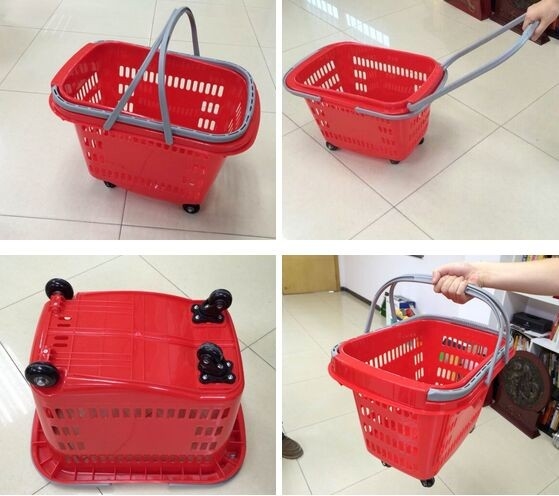 Cesta de compras roja de HDPP con las ruedas, cesta de compras plástica del almacenamiento del supermercado